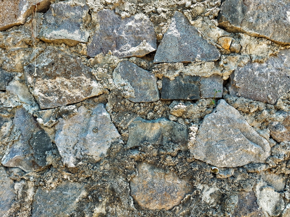 How Routine Fieldstone Maintenance Protects Bedford Homes from Moisture Damage
