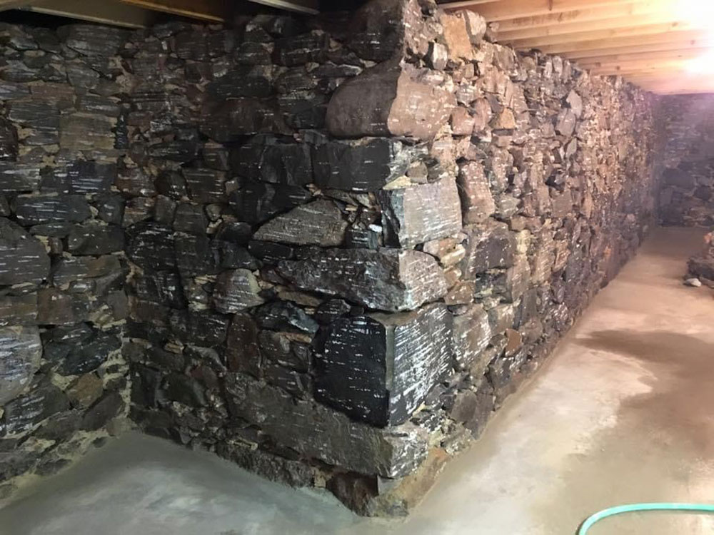 Why Stone Foundations Leak in Somerville & Medford — And How Professional Waterproofing Solves It